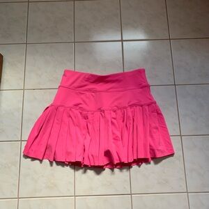 Hot pink pleated athletic skirt
